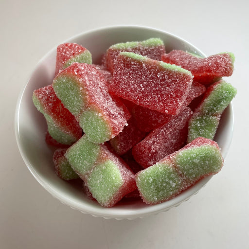 watermelon candy in a white bowl