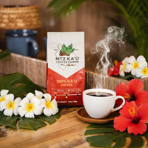 Red and white coffee bag from MTZ Ka'u Coffee Farms on a wooden surface.