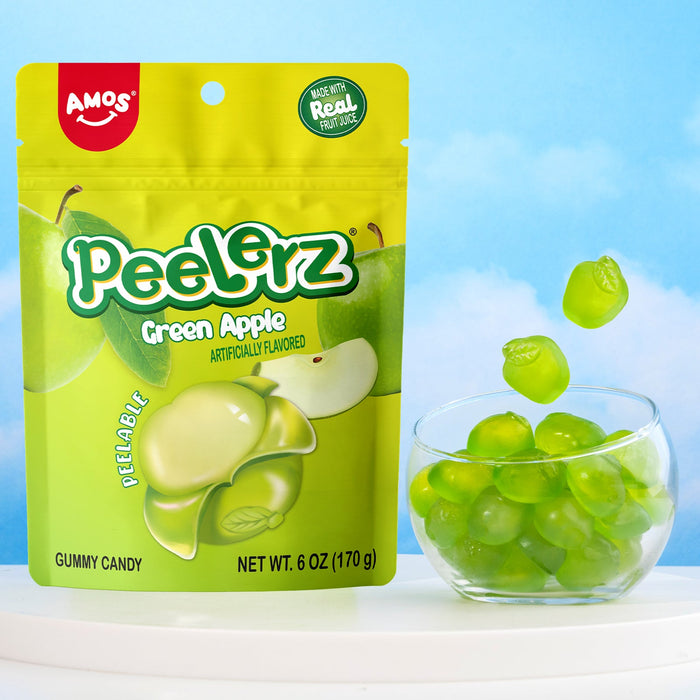 Green apple gummy candy package with a bowl of candy on a blue background