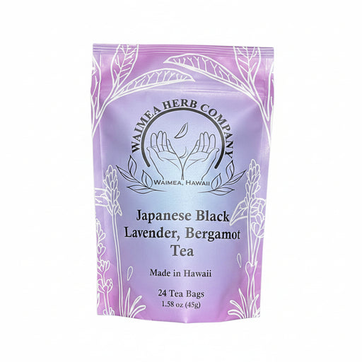Purple package of Waimea Herb Company Japanese Black Lavender Bergamot Tea on a white background
