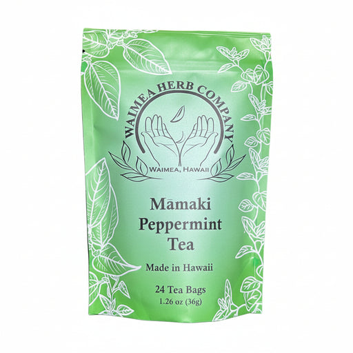 Green package of Mamaki Peppermint Tea from Waimea Herb Company on a light background