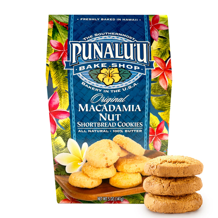 Punalu'u Bake Shop Original Macadamia Nut Shortbread Cookies in blue box with tropical flowers and cookies in the fore front stacked three high